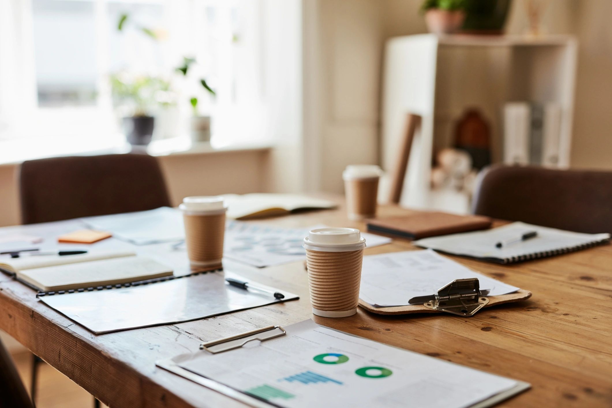 Documents and planning materials on a desk